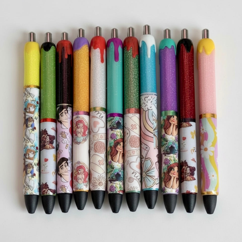 Colorful pens with various designs on a white background
