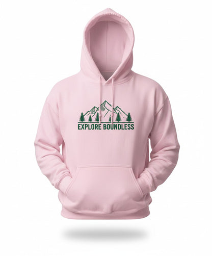 Pink hoodie with mountain and tree design and 'Explore Boundless' text on a white background