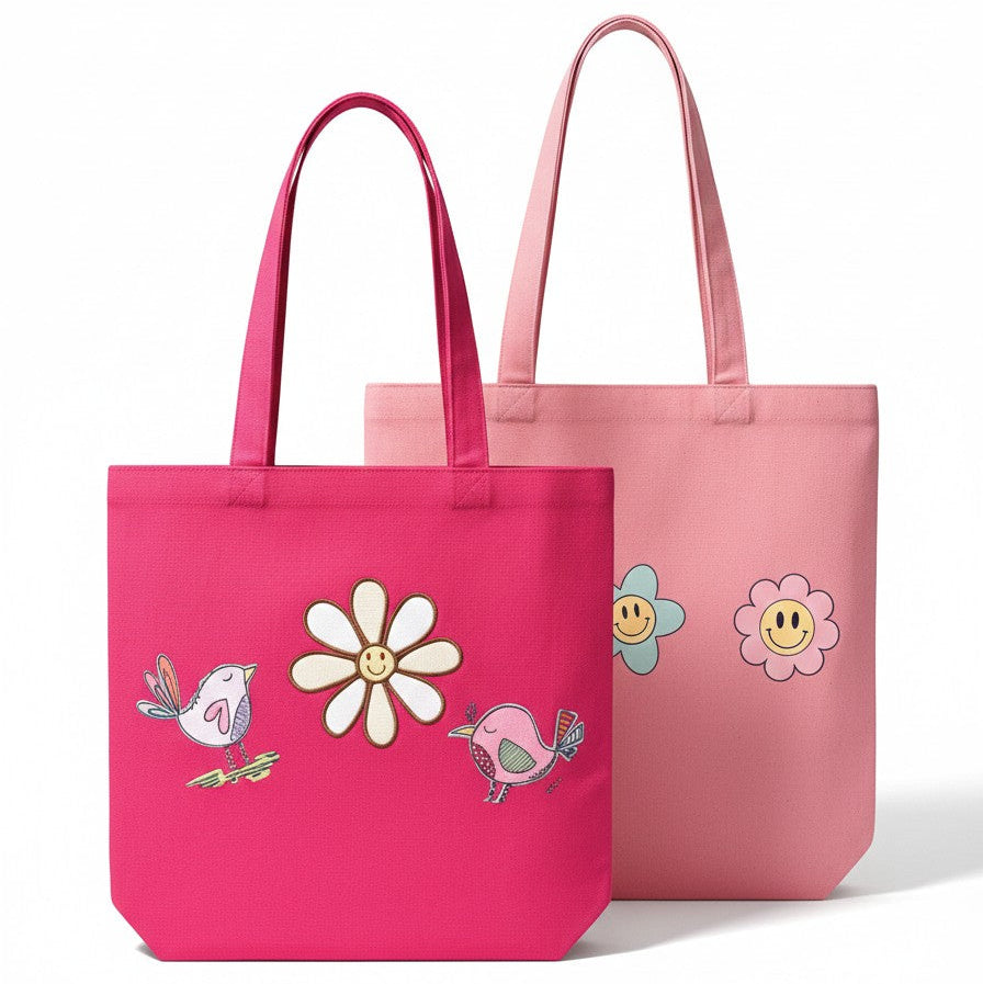 Two pink tote bags with floral and bird designs on a white background